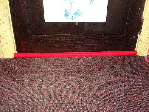 Door draft stopper